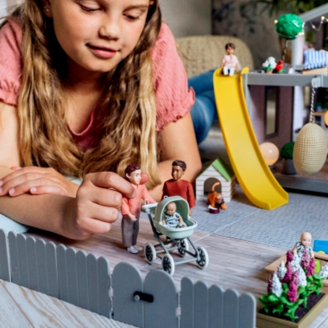Speelfiguur man met kinderwagen en baby
